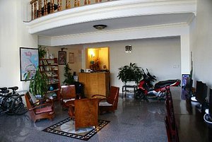 Thien An Hotel in Da Lat, image may contain: Living Room, Floor, Potted Plant, Flooring